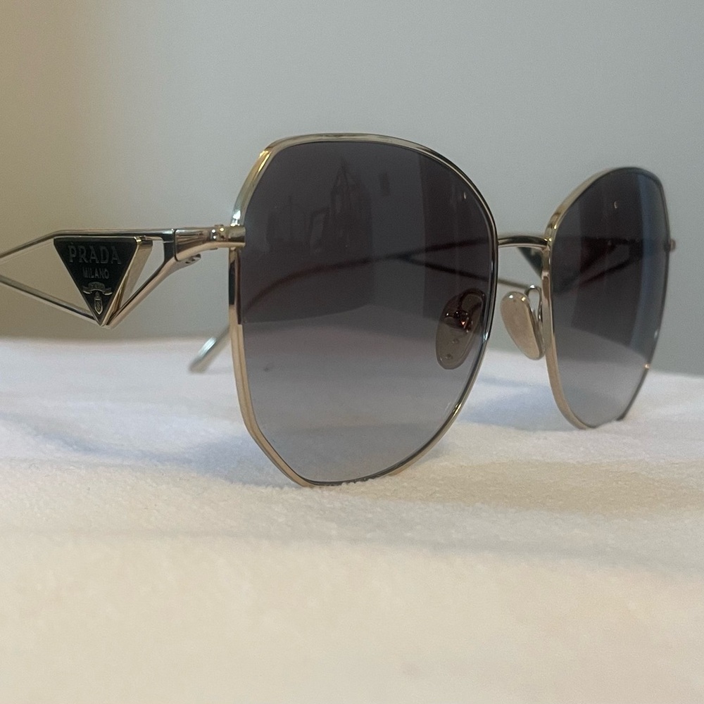 Prada Pale Gold Aviator Sunglasses with Gradient Lenses